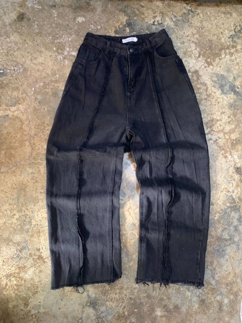 Black Wide Leg Jeans with Raw Hem (Category: Jeans) located in Davao. Submitted by asrielthrift (Listing ID 1441631666, Image 1). Description: - High-waisted black wide-leg jeans - Unique panel stitching on front and back - Raw hem detail - Versatile for streetwear looks - Easy to style with various tops.