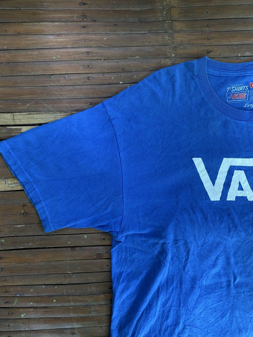 Blue Vans T-shirt (Category: Tshirts & Polo Shirts ) located in Digos. Submitted by oldtuff_ (Listing ID 1441589712, Image 2). Description: - Classic blue Vans t-shirt - Iconic white Vans logo on the front - Made from comfortable material - Perfect for casual wear - Size: Large.
