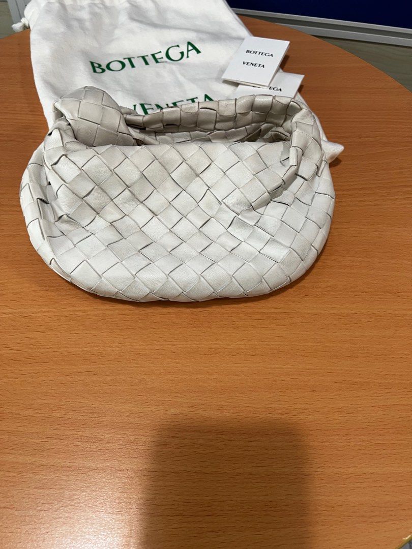 Bottega Veneta Jodie Mini (White) (Category: Luxury Bags & Wallets) located in Makati City. Submitted by Chimochi (Listing ID 1441710292, Image 3). Description: BV Jodie Minis White Authentic Minor discoloration in handle due to usage but can be cleaned professionally Last price. No to lowballers.