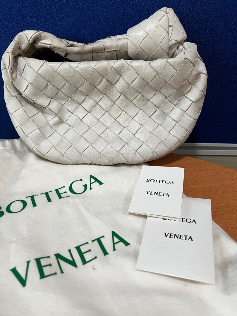 Bottega Veneta Jodie Mini (White) (Category: Luxury Bags & Wallets) located in Makati City. Submitted by Chimochi (Listing ID 1441710292, Image 2). Description: BV Jodie Minis White Authentic Minor discoloration in handle due to usage but can be cleaned professionally Last price. No to lowballers.