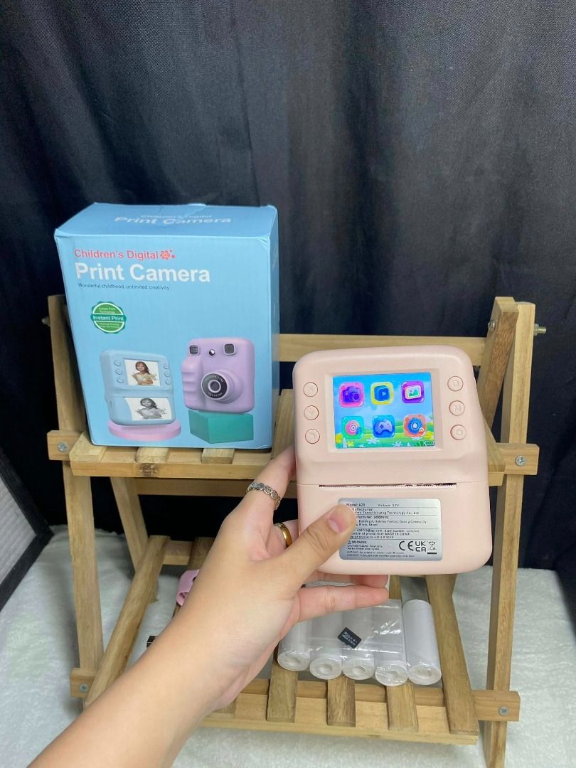 Brandnew INSTAX STYLE PRINT CAM (Category: Cameras) located in Quezon City. Submitted by mjmassortedfinds (Listing ID 1441672933, Image 3). Description: INSTAX STYLE PRINT CAM ₱650 Retail ₱599 each minimum 20pcs ₱550 each minimum 100pcs Colors: purple, baby blue, white INCLUSIONS: ✅ with box, lace, charging cable ✅ 32 gb sd card ✅ 5 rolls of paper DETAILS: ✅ music ✅ portable ✅ hd screen ✅ playback ✅ timelapse ✅ with games! ✅ 6x zoom ✅ 2.0 inch sc