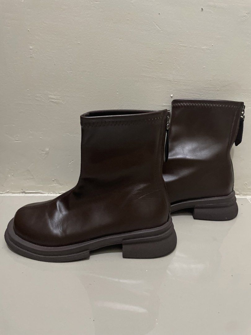 Brown Chunky Sole Chelsea Boots Size 38 (Category: Boots) located in Manila. Submitted by beatan13 (Listing ID 1441592468, Image 2). Description: - Stylish brown boots with a trendy chunky sole. - Easy on and off with a convenient side zip closure. - Features a comfortable stretchy shaft for a flexible fit. - Estimated size: 38. - Ideal for everyday wear and versatile styling. - Selling as they are no longer the right fit..