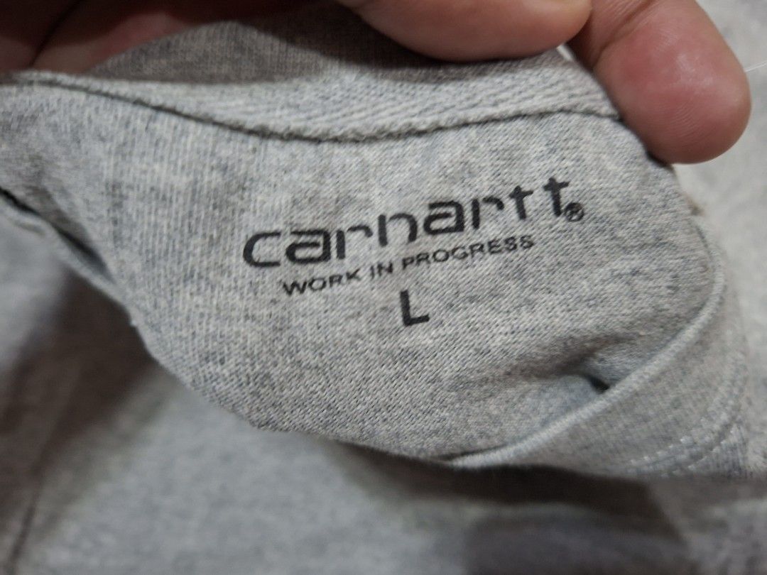 Carhartt Work In Progress Grey T-Shirt Size L (Category: Tshirts & Polo Shirts ) located in Makati City. Submitted by coleencloset (Listing ID 1441676907, Image 3). Description: - Grey Carhartt t-shirt - Features 'Carhartt Work In Progress' graphic on the front - Size: Large (L) - Ideal for casual everyday wear - Issue cut tag.