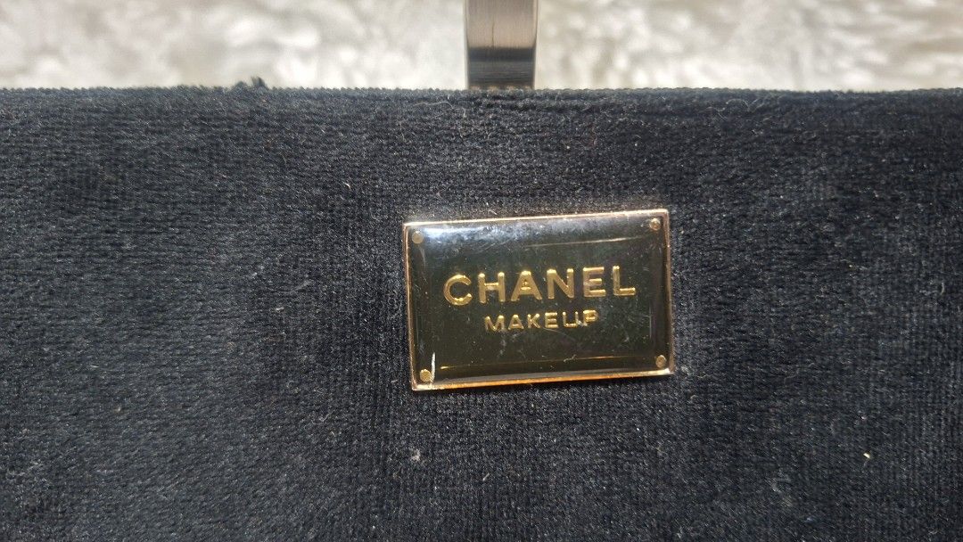 Chanel Makeup Pouch Black Velvet (Category: Luxury Bags & Wallets) located in Panabo. Submitted by Djars_Finds (Listing ID 1441751958, Image 3). Description: - Authentic Chanel makeup pouch - Luxurious black velvet material - Gold tone 'CHANEL MAKEUP PARIS' plaque on front - Gold tone zipper closure with iconic CC logo pull tab - Interior features a small clear label - Ideal for organizing your makeup essentials - This are thrifted items so manag