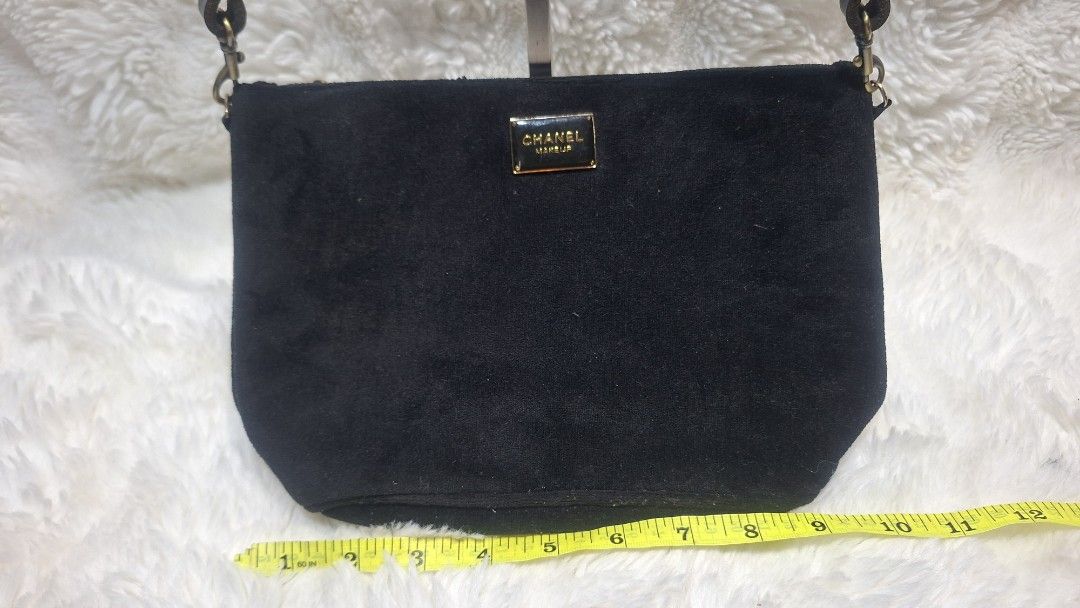 Chanel Makeup Pouch Black Velvet (Category: Luxury Bags & Wallets) located in Panabo. Submitted by Djars_Finds (Listing ID 1441751958, Image 2). Description: - Authentic Chanel makeup pouch - Luxurious black velvet material - Gold tone 'CHANEL MAKEUP PARIS' plaque on front - Gold tone zipper closure with iconic CC logo pull tab - Interior features a small clear label - Ideal for organizing your makeup essentials - This are thrifted items so manag