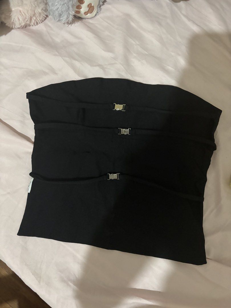 [Clothes for Breakfast] Irina Black backless buckle top (Category: Sleeveless) located in Quezon City. Submitted by luneco.ph (Listing ID 1441704203, Image 2). Description: ☆ : [Clothes for Breakfast] Irina Black backless buckle top ꒰ఎ ★ ໒꒱ price: 500 (bought for 750) size: one size dm for when worn Recommended for frames: XS to SEMI-MEDIUM * Dimensions & details when laid flat: * length: 13” * armpit to armpit: 14” (semi-stretchable, fits up to 