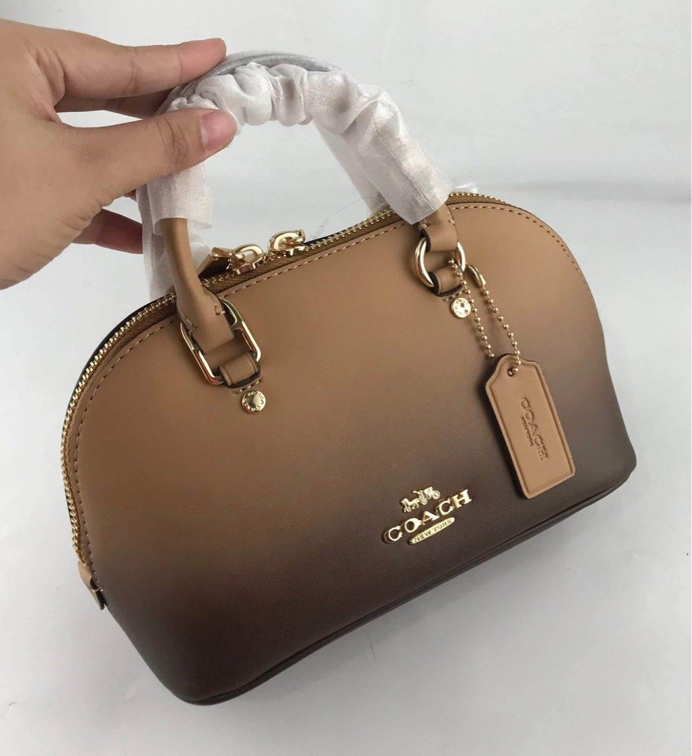 Coach Lara Mini Satchel Bag in Ombre (Category: Cross-body Bags) located in Marikina City. Submitted by smthxtra (Listing ID 1441754949, Image 1). Description: Length:22cm Width:10cm Height:12cm Zip closure Detachable strap With tag, care card, dust bag, and paper bag included.