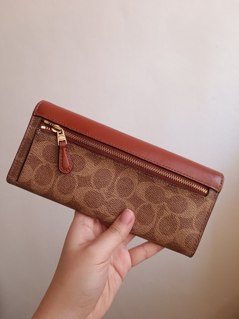Coach soft wyn long wallet (Category: Wallets & Card holders) located in Paranaque City. Submitted by earlylux (Listing ID 1441645509, Image 2). Description: Guaranteed Authentic Made in Philippines Please inspect photos for signs of usage/flaw No inclusions! Normal signs of usage please manage your expectations you're buying a secondhand bag. Pm for more details No return, no refund, no exchange, no cancellation! First to pay Joy miners will be 