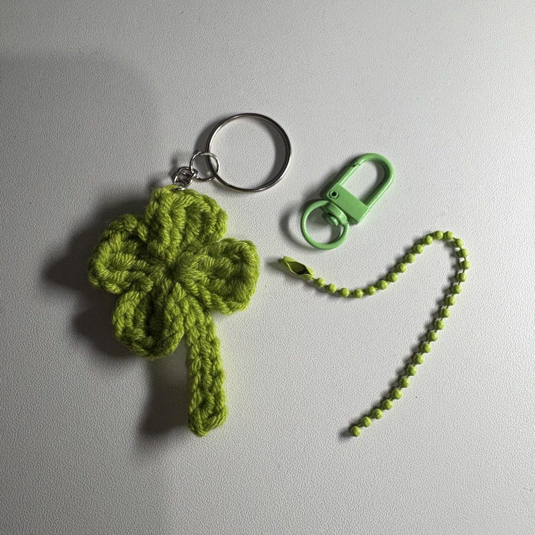 Crocheted Four-leaf Clover (Category: Handmade Craft) located in Magalang. Submitted by dclutter_ki (Listing ID 1441749197, Image 1). Description: Open for per piece and bulk orders. Ring Chain and Ball Bead Chain: 1 piece - ₱15 10 pieces - 140 15 pieces - 210 20 pieces - 280 25 pieces - 350 30 pieces - 430 50 pieces - 700 🍀 each comes in individual packages 🍀 add minimal fee for personalized names 🍀₱70 rush fee for bulk orders 🍀 may request 