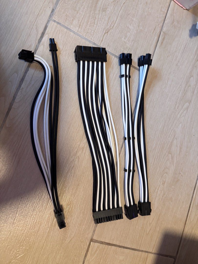 Custom Sleeved PSU Cable Extensions Black White (Category: Cables & Adaptors) located in Manila. Submitted by kohanekuroboshi (Listing ID 1441662329, Image 1). Description: - Custom sleeved PSU cable extensions - Color: Black and White Paracord - Perfect for PC cable management and aesthetics - Clean connectors, ready for installation - Enhance your rig's visual appeal.