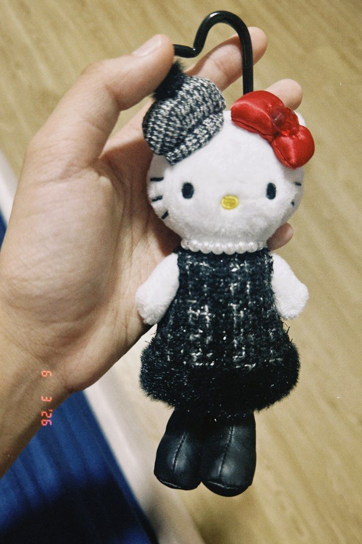 Cute Sanrio & Doll Plush Keychains - Hello Kitty, Kuromi, & More! (Category: Toys & Games) located in Singapore. Submitted by mellymango (Listing ID 1441711578, Image 1). Description: - Adorable plush keychains available. - Features various Kitty designs. - Includes a Kuromi charm. - Unique doll in a fuzzy blue outfit. - Perfect for decorating bags, backpacks, or as a cute accessory. - Each keychain has a distinct style and personality. - Ideal f