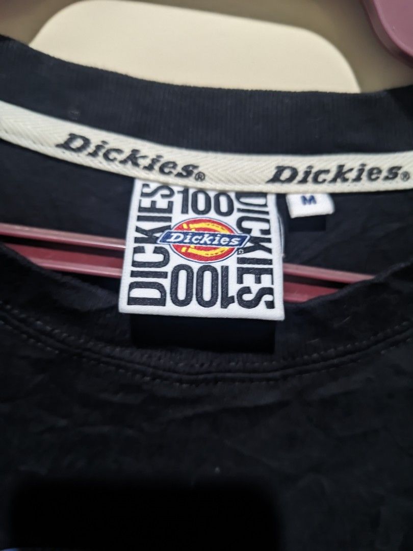 Dickies Black T-Shirt Size M (Category: Tshirts & Polo Shirts ) located in Calapan. Submitted by ideals_06 (Listing ID 1441712282, Image 3). Description: - Classic Dickies logo with a vibrant tie-dye effect - Features a bold '100' print - Made from 100% comfortable cotton - Size Medium -Can fit to large - Ideal for everyday casual wear.