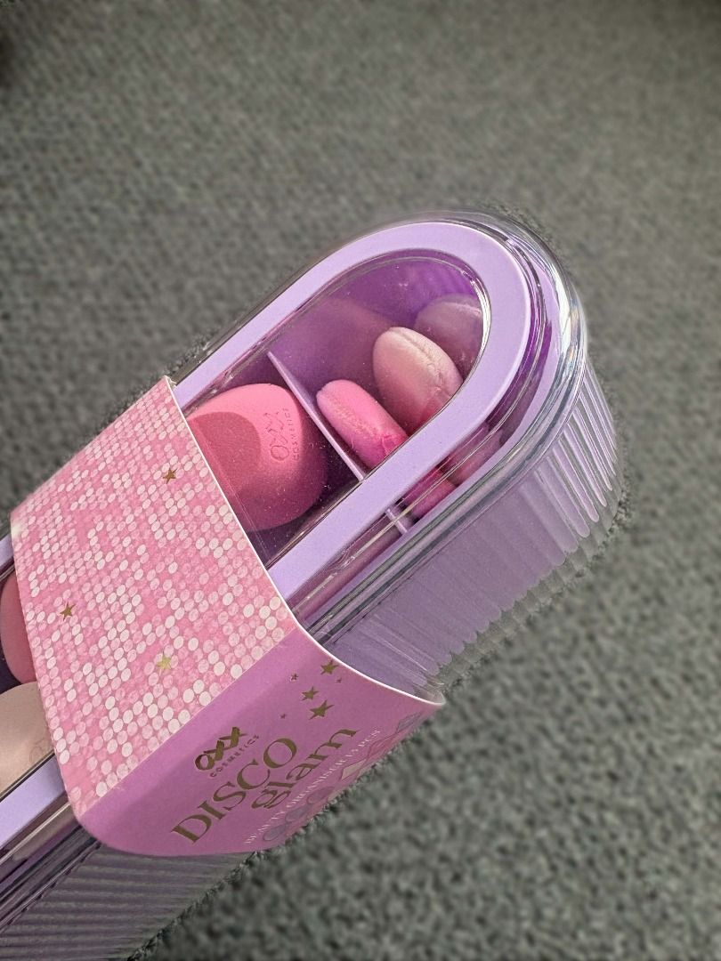Brand New Disco Glam Makeup Sponge Set (Great Value) (Category: Makeup) located in Pasig City. Submitted by whiteglove (Listing ID 1441736050, Image 1). Description: Brand new OXX Disco Glam makeup sponge set for sale. 💜 Perfect for makeup lovers 💜 12 flat and egg-shaped sponges 💜 Comes in a cute, sturdy organizer with dividers TO ORDER: Please make an offer- see listed price. Cashless payment only 🙂 Maya or GoTyme SHIPPING: The item is avail