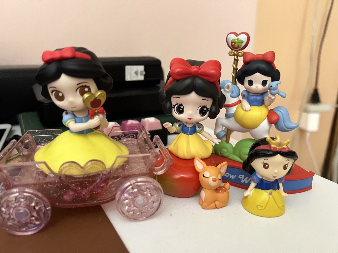 Disney Snow White Chibi Figurines Set with Carriage (Category: Designer & Blind Box Toys) located in Marikina City. Submitted by panowps (Listing ID 1441704796, Image 1). Description: - Adorable Snow White chibi figurine set. - Includes Snow White in a carriage. - Comes with a standing Snow White figure. - Also includes a cute deer figure. - Ideal for Disney collectors and fans. - Creates a charming display when shown together. - Snow white in a 