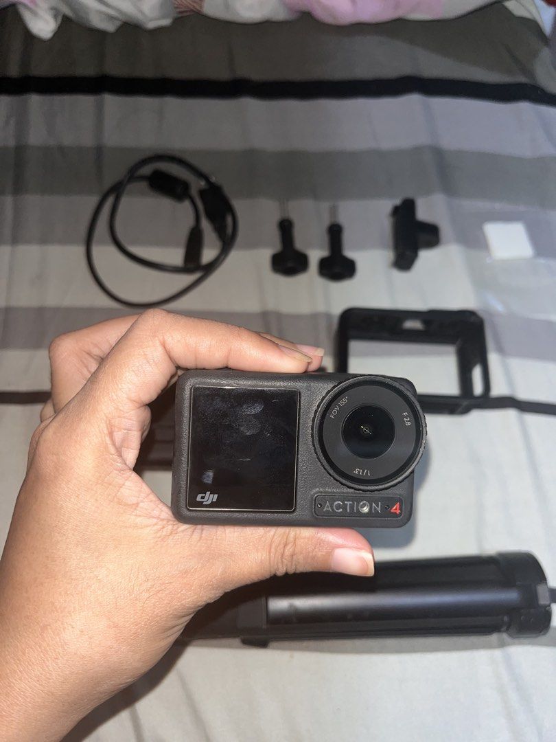 DJI ACTION 4 (Category: Cameras) located in Manila. Submitted by sarahjane71650 (Listing ID 1441775621, Image 3). Description: DJI ACTION 4 Adventure Combo ₱16.5k Inclusion: 1× DJI Osmo Action 4 camera 3× Extreme Batteries 1× Multifunctional Battery Case (charges and stores batteries) 1× 1.5m Extension Rod / Selfie Stick 1× Horizontal-Vertical Protective Frame 1× Quick-Release Adapter Mount 2× Locking Screws 1× USB-C to USB-C PD Cable 1× Lens Hoo