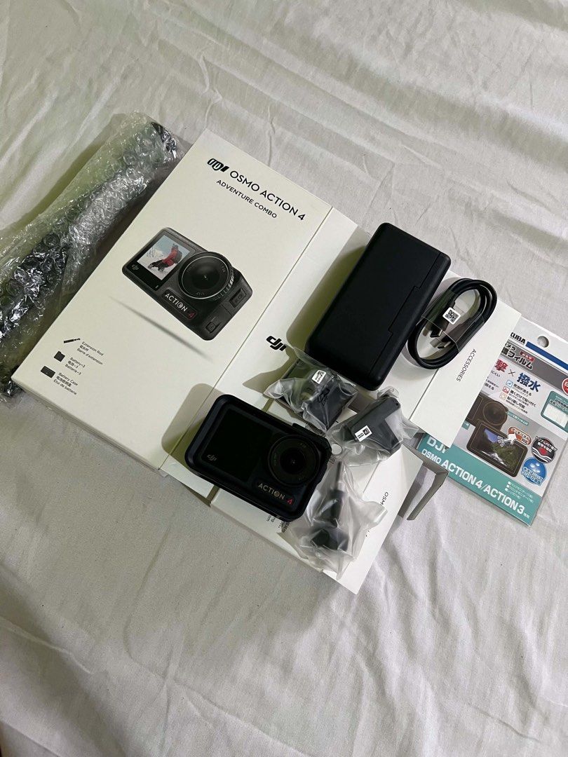 DJI Osmo Action 4 Adventure Combo (Category: Cameras) located in Marikina City. Submitted by christophermozo (Listing ID 1441738051, Image 1). Description: - DJI Osmo Action 4 Adventure Combo - Includes camera, charging case, and batteries - Various accessories included - Original packaging intact - Ideal for capturing all your adventures .