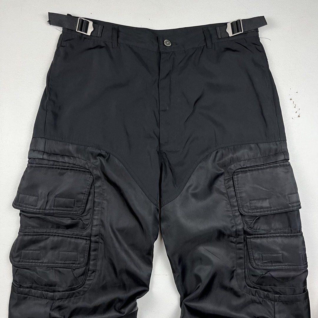 Far From What Nylon Cargo Pants (Category: Trousers) located in Manila. Submitted by _jaime (Listing ID 1441649492, Image 2). Description: Far From What Nylon Cargo Pants Size: 3 Waist: 33 inches Front rise: 13 inches thigh: 12 inches knee: 11 inches Inseam: 32.5 inches Length: 42.5 inches Hem: 10 inches 1,200 price is negotiable.