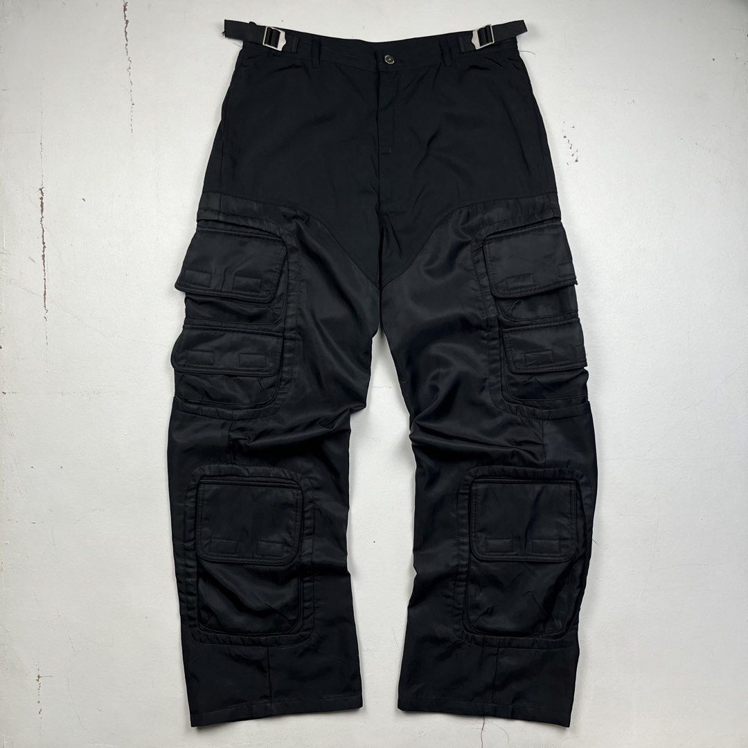 Far From What Nylon Cargo Pants (Category: Trousers) located in Manila. Submitted by _jaime (Listing ID 1441649492, Image 1). Description: Far From What Nylon Cargo Pants Size: 3 Waist: 33 inches Front rise: 13 inches thigh: 12 inches knee: 11 inches Inseam: 32.5 inches Length: 42.5 inches Hem: 10 inches 1,200 price is negotiable.