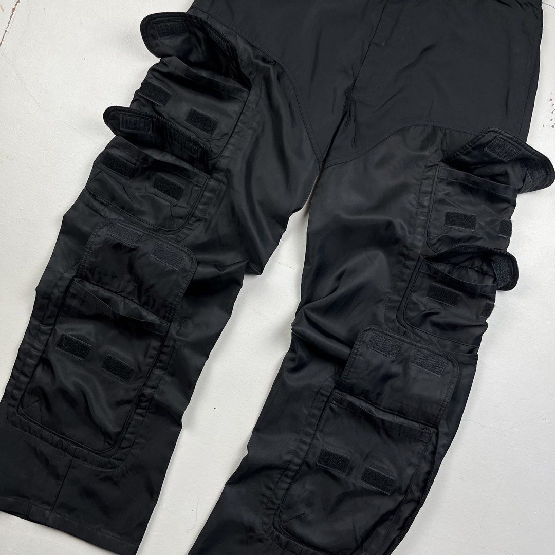 Far From What Nylon Cargo Pants (Category: Trousers) located in Manila. Submitted by _jaime (Listing ID 1441649492, Image 3). Description: Far From What Nylon Cargo Pants Size: 3 Waist: 33 inches Front rise: 13 inches thigh: 12 inches knee: 11 inches Inseam: 32.5 inches Length: 42.5 inches Hem: 10 inches 1,200 price is negotiable.