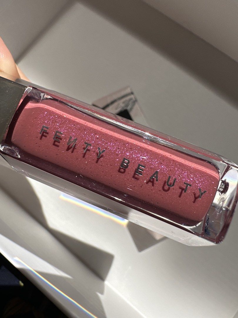 Fenty Beauty Gloss Bomb Universal Lip Luminizer RIRI (Category: Makeup) located in Cebu City. Submitted by cebucitybased (Listing ID 1441644091, Image 1). Description: Brand New Fenty Beauty Gloss Bomb Universal Lip Luminizer Shade: 08 RIRI Weight: 9ml.