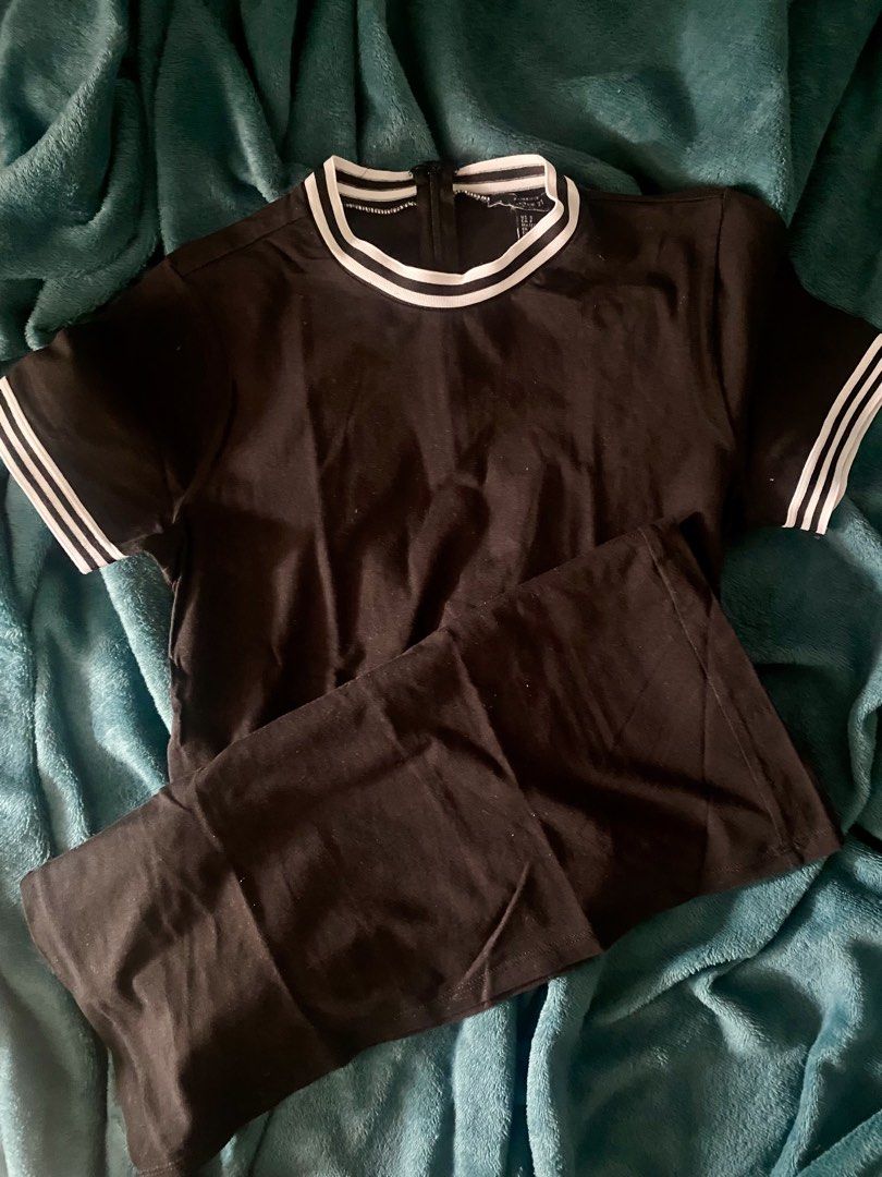 Forever 21 Bodycon Dress (Category: Sleeveless) located in Leyte. Submitted by declutterthis__ (Listing ID 1441590544, Image 1). Description: - Brand: Forever 21 - Color: Black with white stripes - Features: Striped collar and sleeves, back zipper closure - Style: Casual wear.