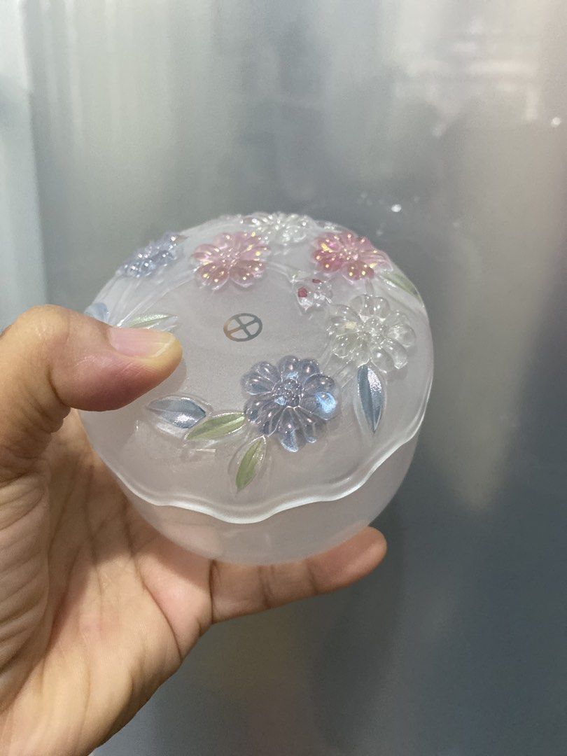 Frosted Glass Jar with Floral Embossing (Category: Vases & Decorative Bowls) located in Muntinlupa City. Submitted by lay_away_ok (Listing ID 1441588862, Image 1). Description: - Frosted glass jar - Beautiful floral embossing with pink, blue, and clear flowers - Subtle floral etching inside - Ideal for storing small trinkets - Doubles as a decorative piece .