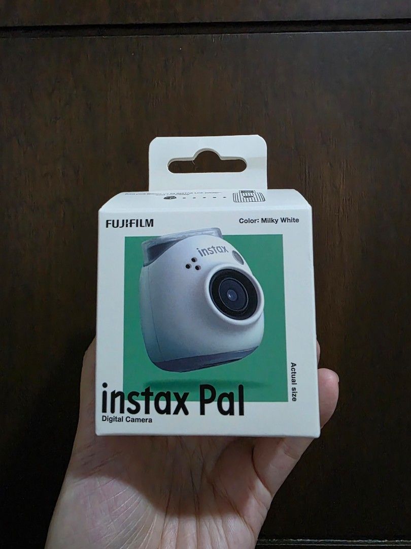Fujifilm Instax Pal Digital Camera - Milky White (Category: Cameras) located in Lipa City. Submitted by carmeladrr (Listing ID 1441611747, Image 1). Description: Capture memories with the Fujifilm Instax Pal digital camera in Milky White! Package includes camera, multi-use lens/shutter ring, and charging cable. Requires Instax Link printer for printing. FREE SF.