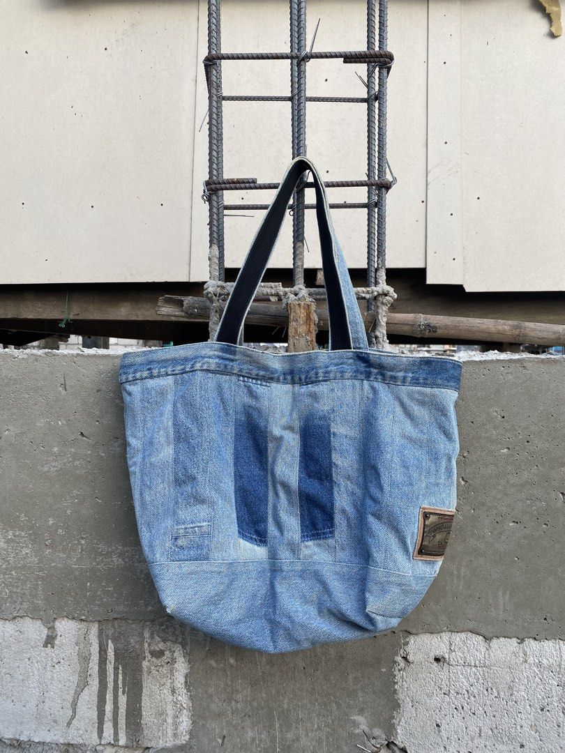Giorgio Armani totebag (Category: Luxury Bags & Wallets) located in Candaba. Submitted by dejesus.bench17 (Listing ID 1441650387, Image 2). Description: Giorgio Armani Jeans Denim Totebag -Good for daily -Excellent Condition -No issue at all -Wash only -Marami pwede ilagay -Price: 550 + ship.