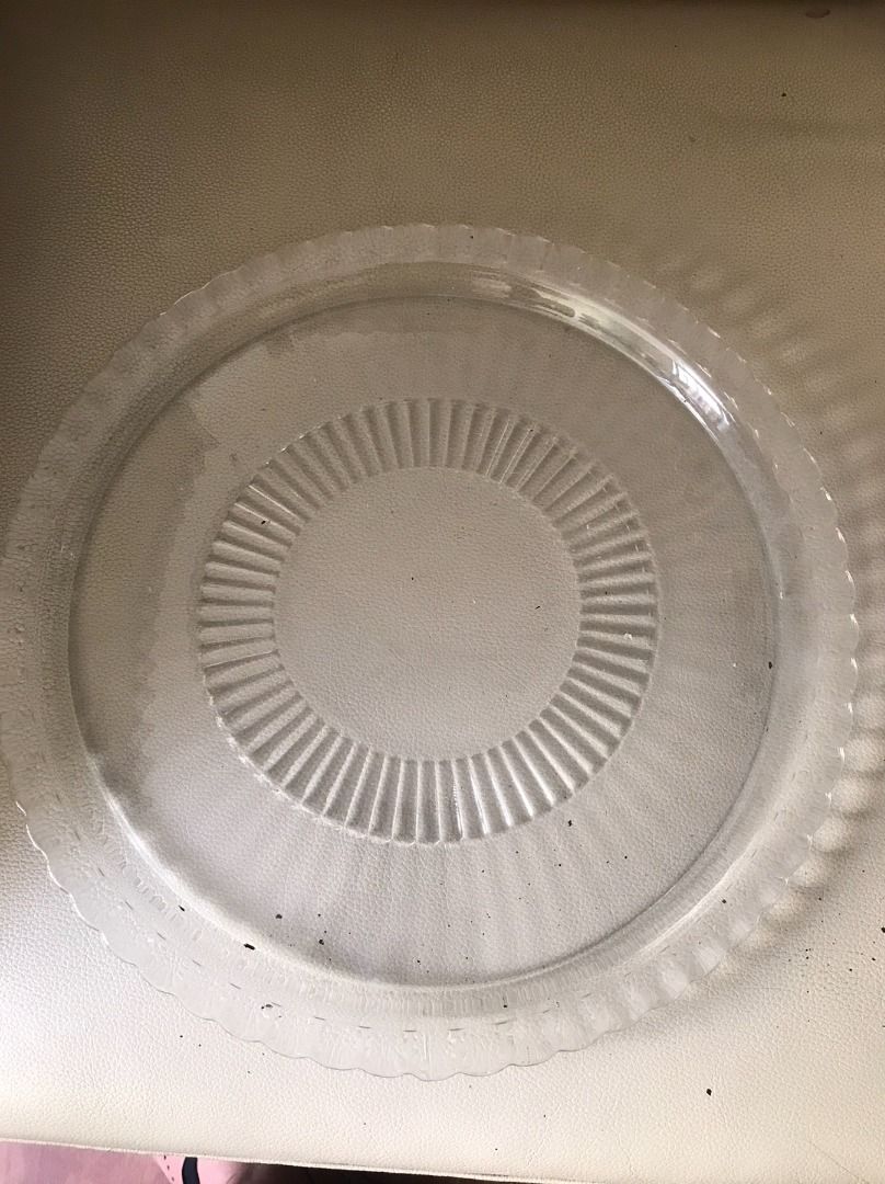 Glass Cake Base/Plate (Category: Bakeware) located in Quezon City. Submitted by foxsquaredeals (Listing ID 1441607378, Image 1). Description: 12.5" 3pcs available RFS: Used from previous business Own pick up/SF shouldered by buyer. MOP: Cash upon pick up, BDO, BPI or Chinabank.