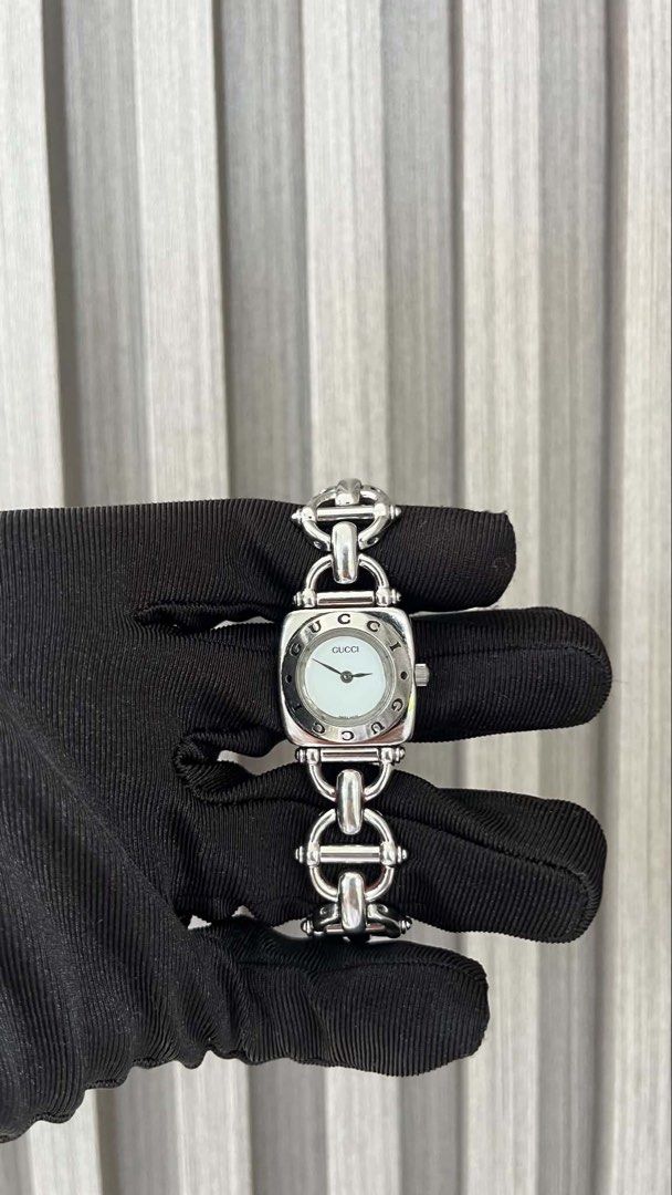 Gucci horse shoe silver watch (Category: Women's Watches) located in Macabebe. Submitted by _tiffanylopez (Listing ID 1441733156, Image 1). Description: Gucci horse shoe silver Quartz movement 22mm 16cm wrist size Good running condition All original.