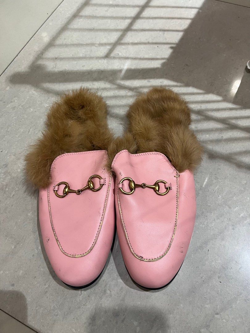 Gucci Pink Leather Fur Mules Slides Size 38 (Category: Slippers and slides) located in Caloocan City. Submitted by pumarenluc79160 (Listing ID 1441643216, Image 1). Description: - Pink leather mules - Fur trim - Gold horsebit detail - Made in Italy - Size: 38 - Condition: Minor scuffs on leather, some wear on soles - A true statement piece!.