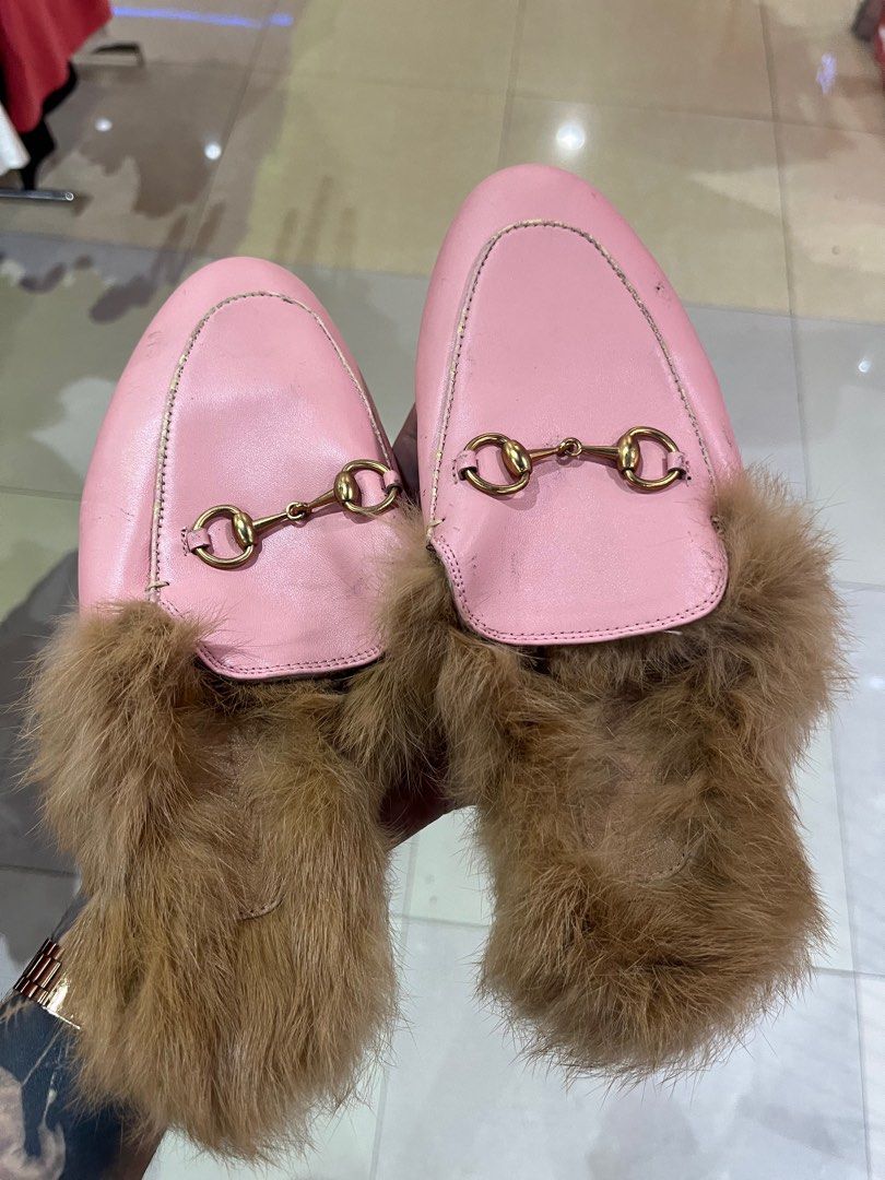 Gucci Pink Leather Fur Mules Slides Size 38 (Category: Slippers and slides) located in Caloocan City. Submitted by pumarenluc79160 (Listing ID 1441643216, Image 2). Description: - Pink leather mules - Fur trim - Gold horsebit detail - Made in Italy - Size: 38 - Condition: Minor scuffs on leather, some wear on soles - A true statement piece!.