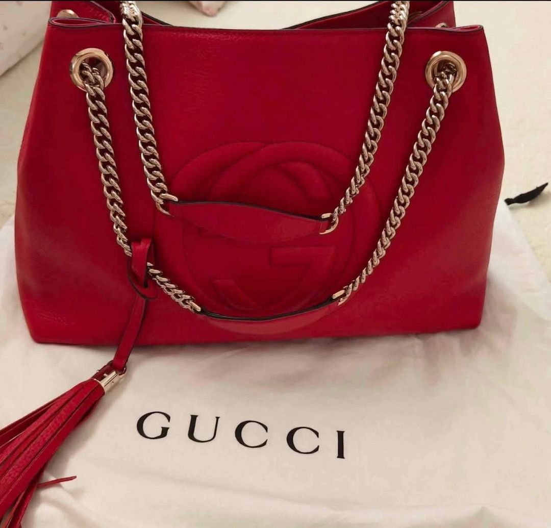 Gucci Red Leather Chain Shoulder Bag (Category: Luxury Bags & Wallets) located in Rizal. Submitted by magracias (Listing ID 1441702663, Image 2). Description: - Authentic Red Leather Gucci Soho Bag - Iconic Embossed Interlocking G Logo - Gold-Tone Chain Strap - Signature Tassel Detail - Interior Zip Pocket and Slip Pocket - Comes with Dust Bag and Authenticity Cards - Bought from Belgium.