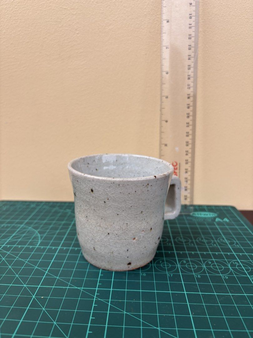 Handmade Ceramic Mug with Speckled Glaze (Category: Coffee & Tea Tableware) located in Antipolo. Submitted by anabri (Listing ID 1441679346, Image 1). Description: - Unique handmade ceramic mug - Light grey speckled glaze with a crackle finish - Sturdy handle for comfortable grip - SEE PHOTOS FOR DETAILS .