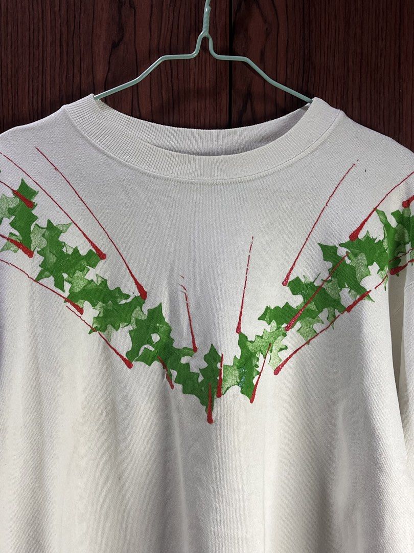 Hanes White Christmas Sweatshirt (Category: Coats, Jackets and Outerwear) located in Manila. Submitted by chiyooo787 (Listing ID 1441752093, Image 2). Description: 24L by 22.5W Brand: Hanes Color rate: 9/10 Issue: crack green and red prints rfs: too small on me now +sf for buyers.