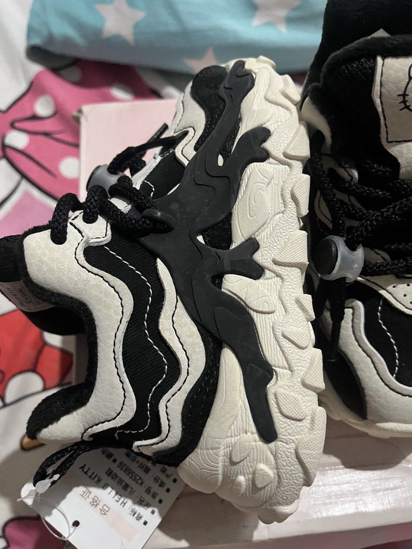 Hello Kitty Kids' Black & White Chunky Sneakers (Category: Babies & Kids Fashion) located in Manila. Submitted by christinali23 (Listing ID 1441714599, Image 2). Description: - Adorable Kitty design - Stylish black and white chunky sneakers - Easy to wear with elastic laces - Features a cool, unique sole pattern - Ideal for active kids.