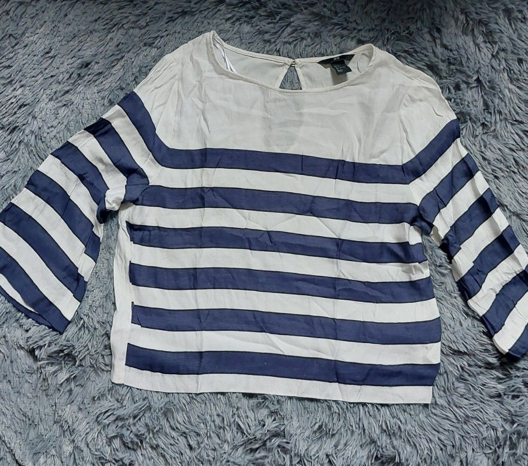 H&M Striped Bell Sleeve Top (Category: Blouses) located in Calasiao. Submitted by _annetastic_ (Listing ID 1441627025, Image 1). Description: Bell sleeve blouse — elegant in actual ✨” “Flowy sleeves, classy vibes 🤍” “Mine na this chic piece!” “Perfect for effortless stylish look 💕” “Wear once, still looks brand new ✨” “Super ganda kapag suot na 😍”.