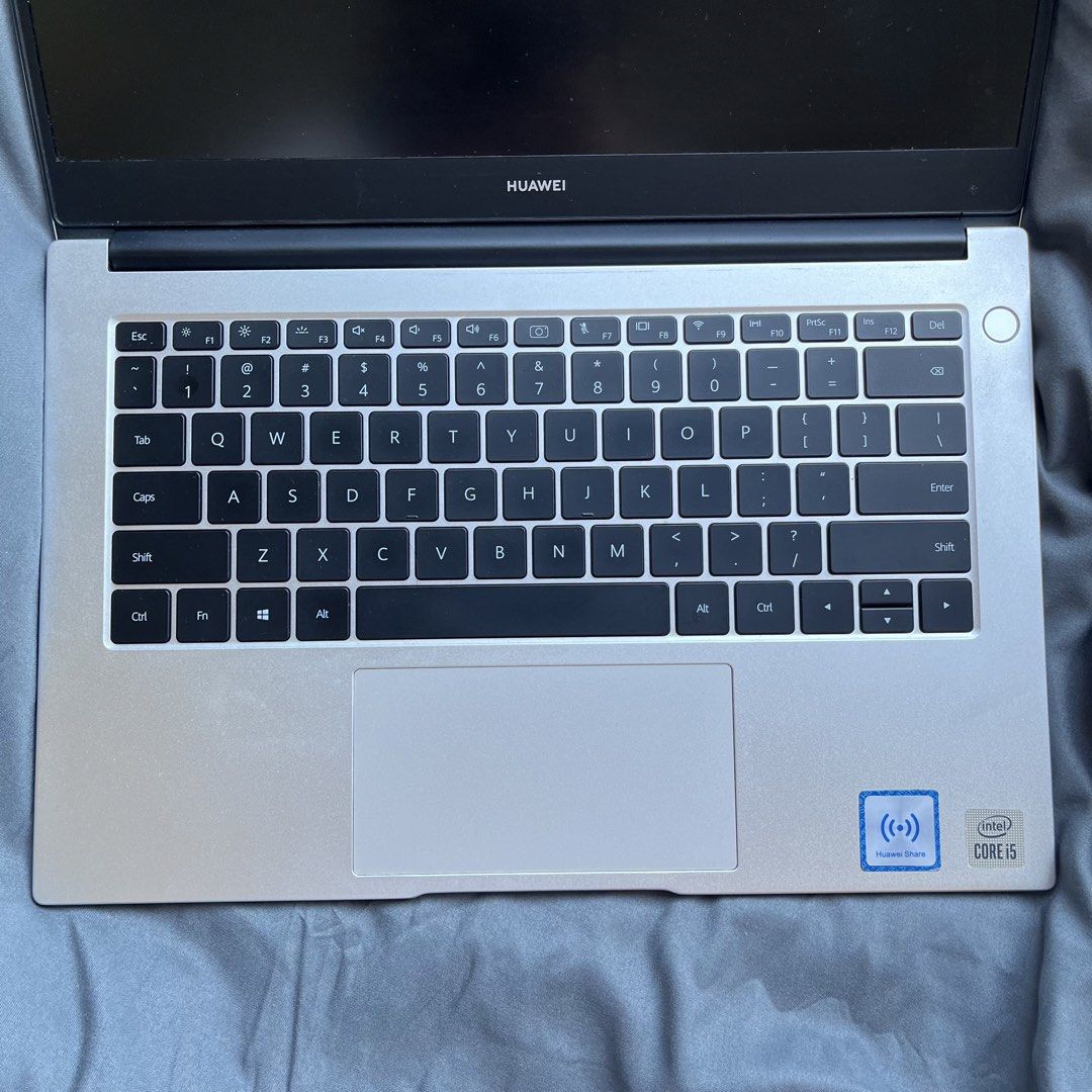 Huawei Matebook D14 (see details below) (Category: Laptops & Notebooks) located in Quezon City. Submitted by dakiclutter (Listing ID 1441705401, Image 3). Description: HUAWEI Matebook D14 Bought from Villman SM North Branch > Sleek design Device name: LAPTOP-SGKGIL7D • Processor: Intel(R) Core(TM) i5-10210U • CPU @ 1.60GHz (2.11 GHz) • Installed RAM: 8.00 GB • System type: 64-bit operating system, x64-based processor • Pen and touch No pen or tou
