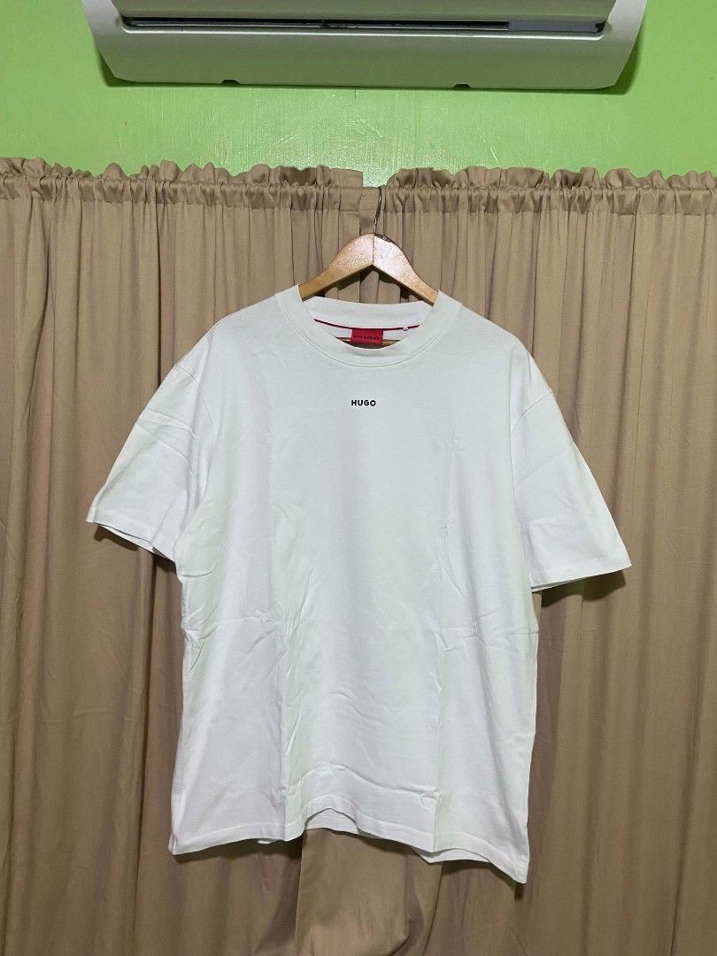 Hugo boss mid rubberize script (Category: Tshirts & Polo Shirts ) located in Alaminos. Submitted by goodeal_garments (Listing ID 1441624739, Image 1). Description: large to xl excellent condition authentic.