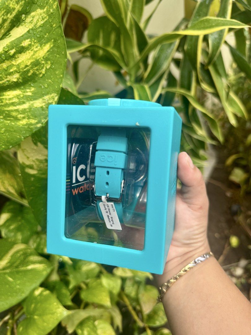 ICE WATCH Teal Watch in Original Box (Category: Women's Watches) located in Cainta. Submitted by danica010314 (Listing ID 1441670232, Image 3). Description: - Teal ICE WATCH - Comes in original cube packaging - Fun graphic design on watch face - Comfortable silicone strap - Ideal for everyday wear or as a gift - Selling as is.