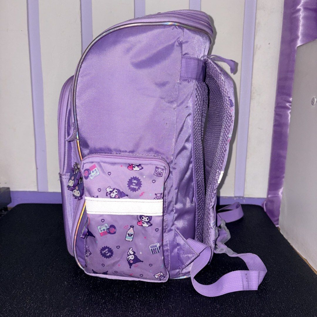 Kuromi Purple kids school backpack (Category: Backpacks) located in Manila. Submitted by danekb (Listing ID 1441762364, Image 3). Description: -all zippers working -minimal ink pen stains -main zipper zips/unzips all the way -has back padding height - approx 38cm / 15 in length (thickness when stuffed) - approx 25 cm / 10 in width - approx 36 cm / 14 in .
