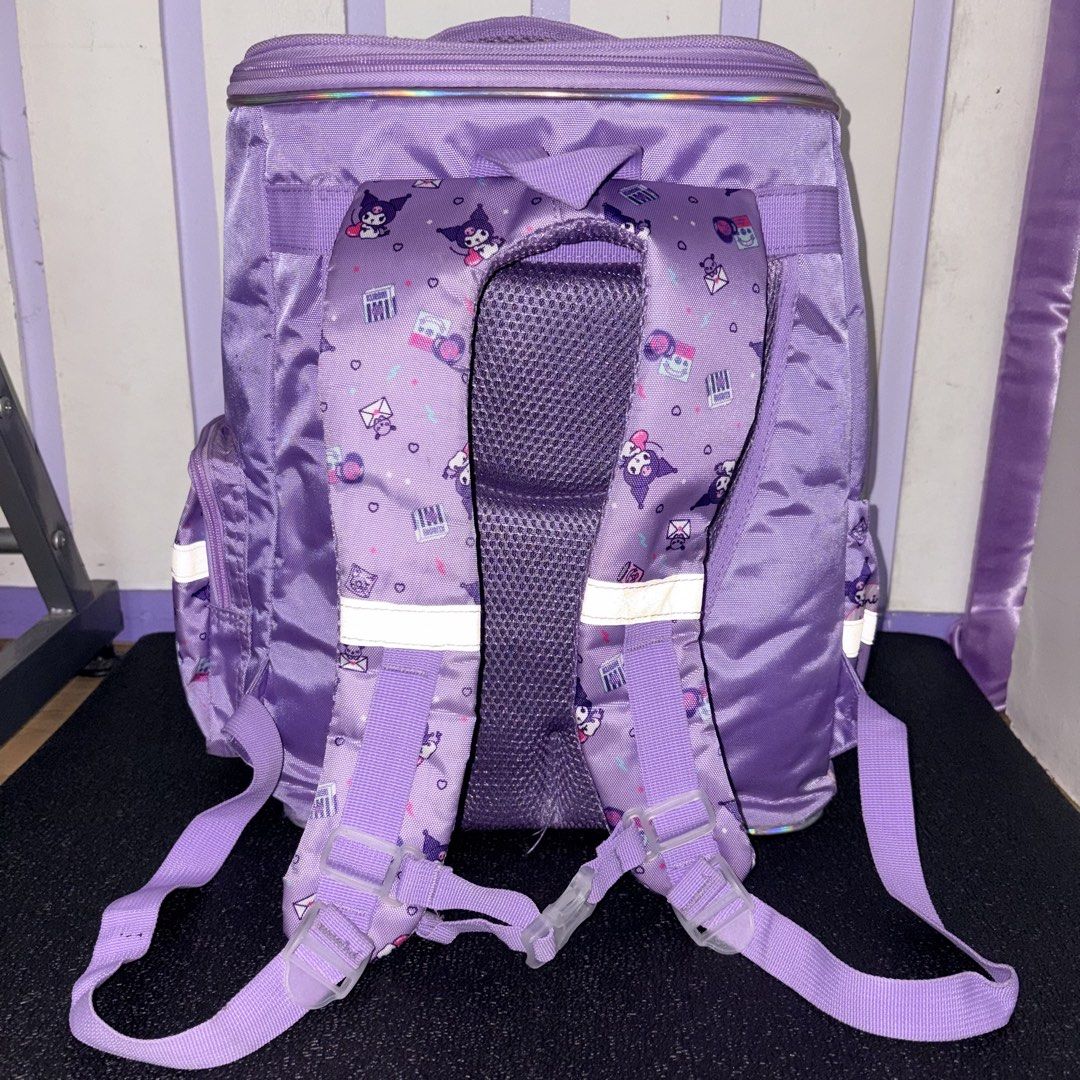 Kuromi Purple kids school backpack (Category: Backpacks) located in Manila. Submitted by danekb (Listing ID 1441762364, Image 2). Description: -all zippers working -minimal ink pen stains -main zipper zips/unzips all the way -has back padding height - approx 38cm / 15 in length (thickness when stuffed) - approx 25 cm / 10 in width - approx 36 cm / 14 in .