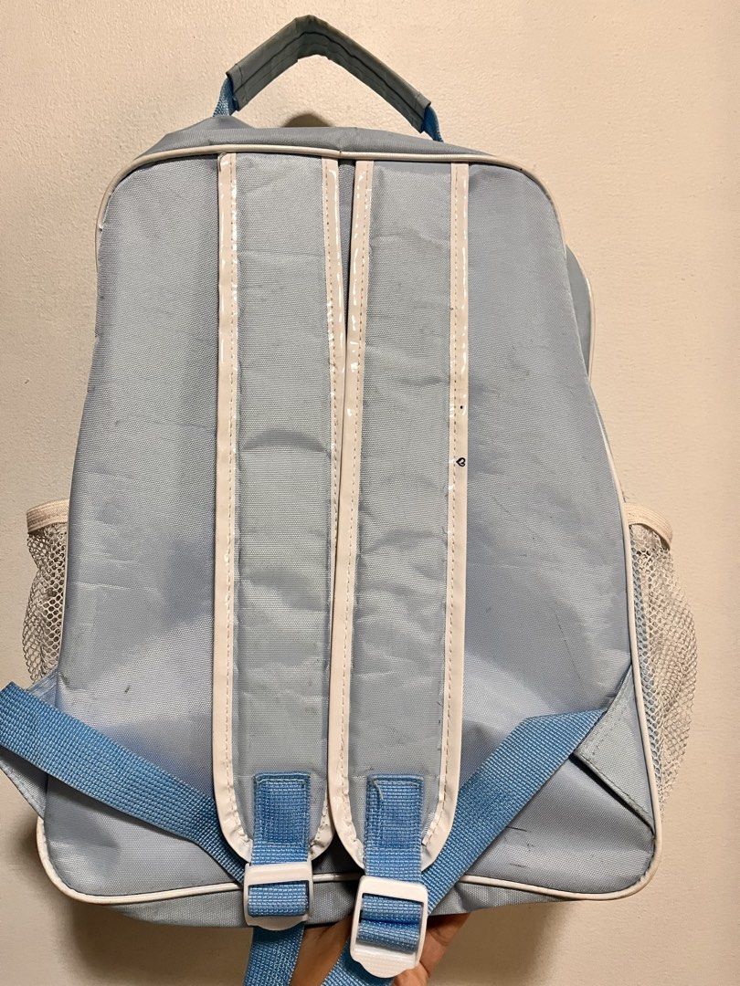 Light Blue Cinnamoroll Backpack (Category: Backpacks) located in Quezon City. Submitted by cthy27 (Listing ID 1441638960, Image 3). Description: - Adorable light blue backpack featuring a Cinnamoroll graphic. - Main compartment for storage. - Convenient front pocket for quick access. - Side mesh pockets ideal for water bottles. - Adjustable straps for a comfortable fit. - Shows minor marks and scuffs from previous use. - Great for school, travel,