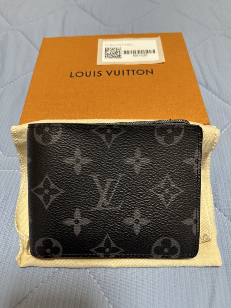 Louis Vuitton Black Leather Bifold Wallet (Category: Luxury Bags & Wallets) located in Makati City. Submitted by rexbonyad (Listing ID 1441741653, Image 3). Description: - Authentic Louis Vuitton Bifold Wallet - Color: Black Leather - Features multiple card slots - Comes with original box - Includes dust bag - Classic and timeless design - Ideal for everyday use.