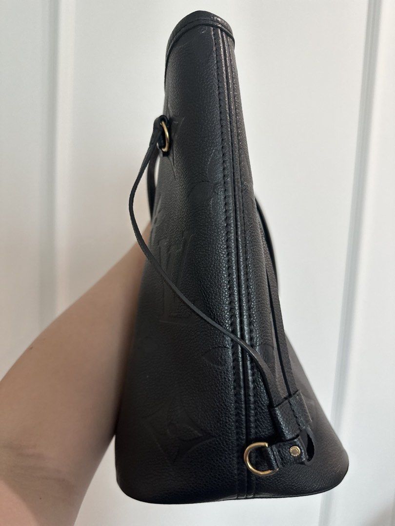 Authentic Louis Vuitton Black Monogram Empreinte Neverfull MM Tote Bag (Category: Luxury Bags & Wallets) located in Pasig City. Submitted by 2ndluxe (Listing ID 1441591896, Image 3). Description: - Authentic Louis Vuitton tote bag - Color: Black - Material: Monogram Empreinte leather - Features: Spacious interior, comfortable shoulder straps - Ideal for: Everyday use, travel - Includes: Original dust bag, Box -Used less than 5x -Bought from LV Si