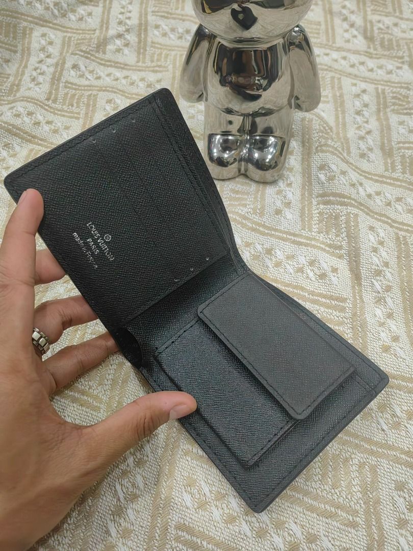 Louis Vuitton Monogram Eclipse Bifold Wallet (Category: Luxury Bags & Wallets) located in Cebu City. Submitted by erlacoleccion (Listing ID 1441749887, Image 3). Description: - Louis Vuitton Wallet - Monogram Eclipse Canvas - Bifold Style - Multiple Card Slots - Bill Compartment - Black and Grey Colorway - Clean Interior - Ideal for Everyday Use.
