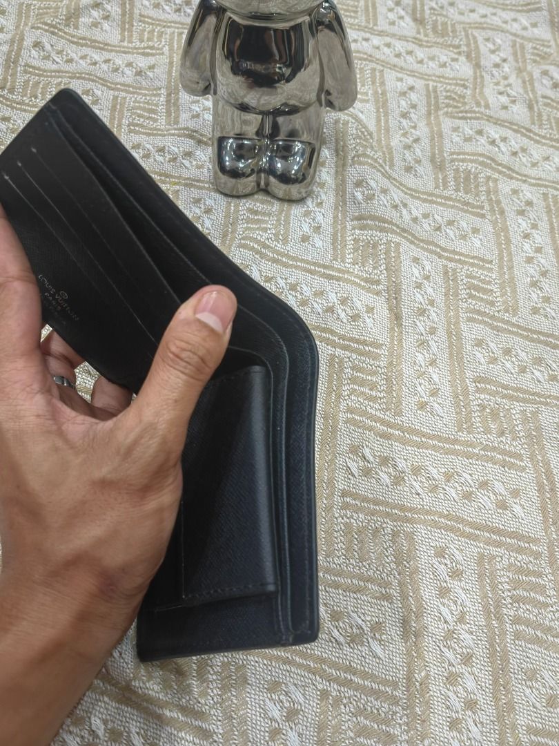 Louis Vuitton Monogram Eclipse Bifold Wallet (Category: Luxury Bags & Wallets) located in Cebu City. Submitted by erlacoleccion (Listing ID 1441749887, Image 2). Description: - Louis Vuitton Wallet - Monogram Eclipse Canvas - Bifold Style - Multiple Card Slots - Bill Compartment - Black and Grey Colorway - Clean Interior - Ideal for Everyday Use.