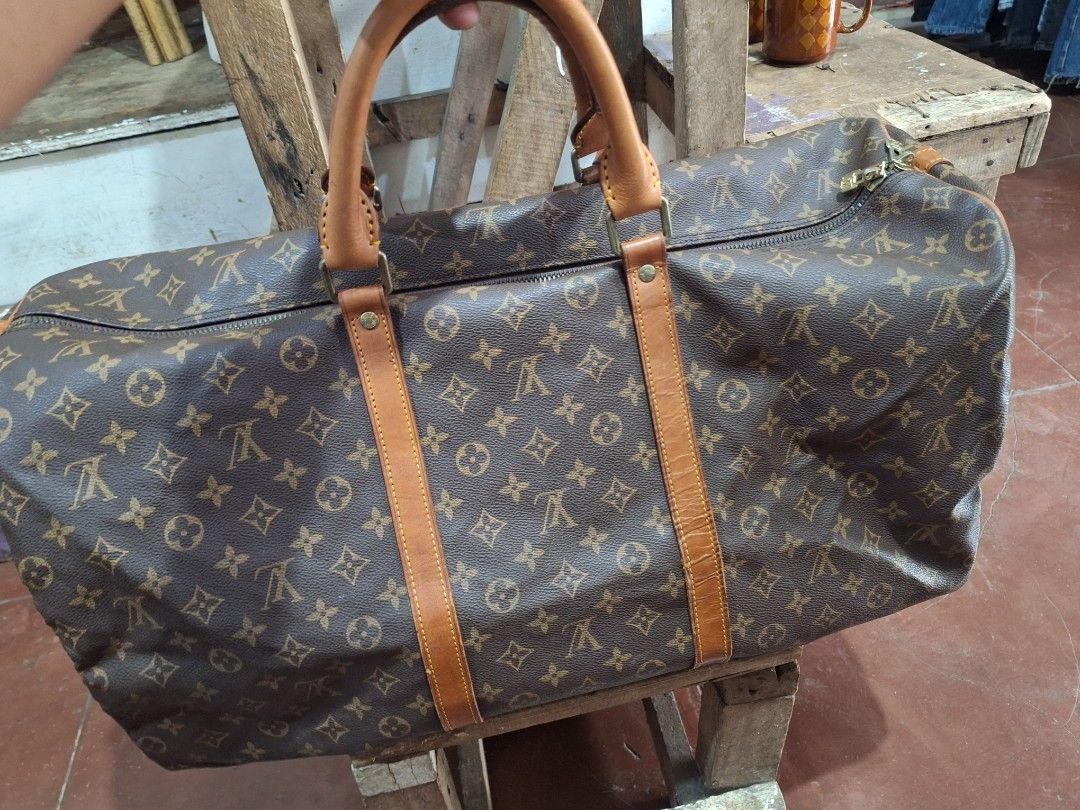 Louis Vuitton Monogram Keepall Duffle Bag (Category: Shoulder Bags) located in Puerto Princesa. Submitted by jercksthriftph (Listing ID 1441626940, Image 2). Description: Louis Vuitton Keepall duffle bag malaki po ito Very Good Condition , need cleaning item is thrifted/ukay.