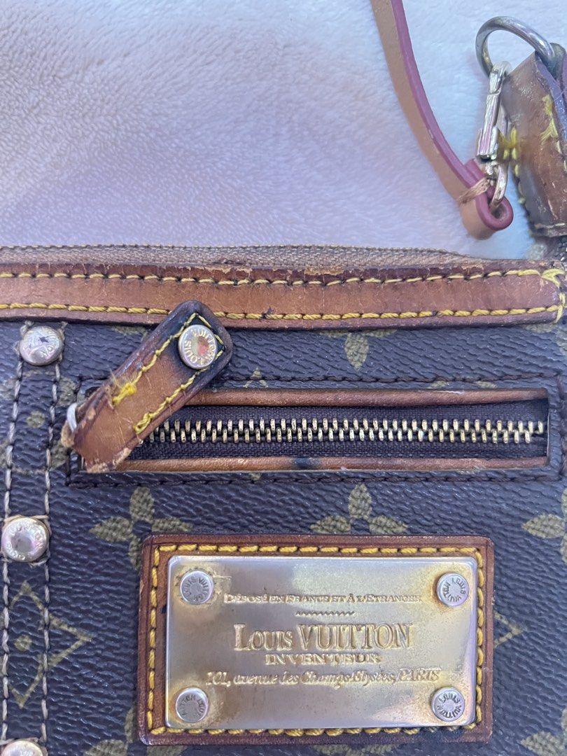 LV rare vintage monogram riveting pochette 2007 (Category: Luxury Bags & Wallets) located in Davao. Submitted by halohalohunter (Listing ID 1441685754, Image 2). Description: LV vintage monogram riveting pochette 2007 rare- limited edition seasonal piece archival price is negotiable -needs some fixing, cleaning and slight restoration on the plates, trims and stitchings -strap is a replacement strap already -very vintage - Classic Monogram Canvas 