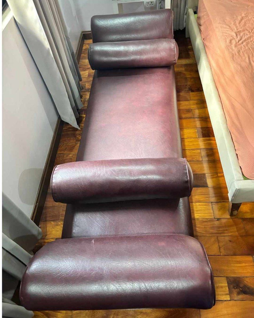 Leather Divan /Chaise Lounge /Daybed (Category: Sofas) located in Quezon City. Submitted by mlt2000 (Listing ID 1441750426, Image 1). Description: - leather chaise lounge - Dimensions: 196cm (width) x 62cm (depth) x 30cm (height) - Comes with two comfortable bolster pillows - Versatile use: ideal for lounging or as a daybed.